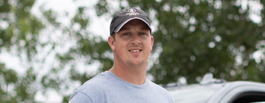 Headshot of Chase Stoll wearing a Champion Seed ball cap